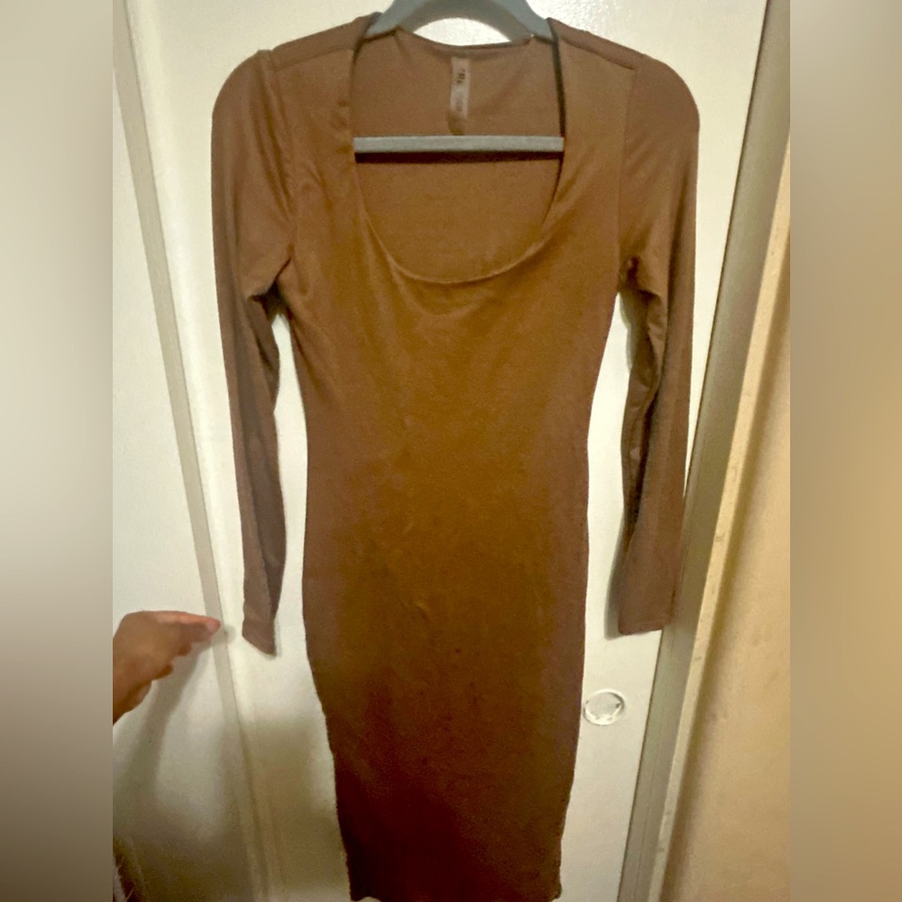 Mocha brown long sleeve dress. Square shoulder. Tight fitting